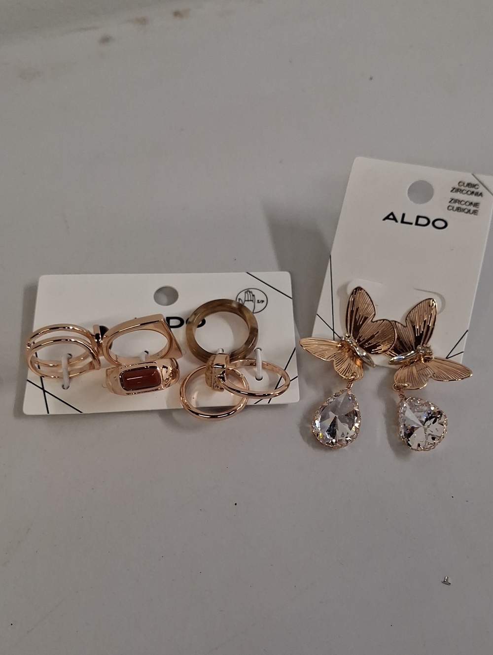 NWT ALDO Rose Gold Butterfly Drop Earrings and 6 Ring Set